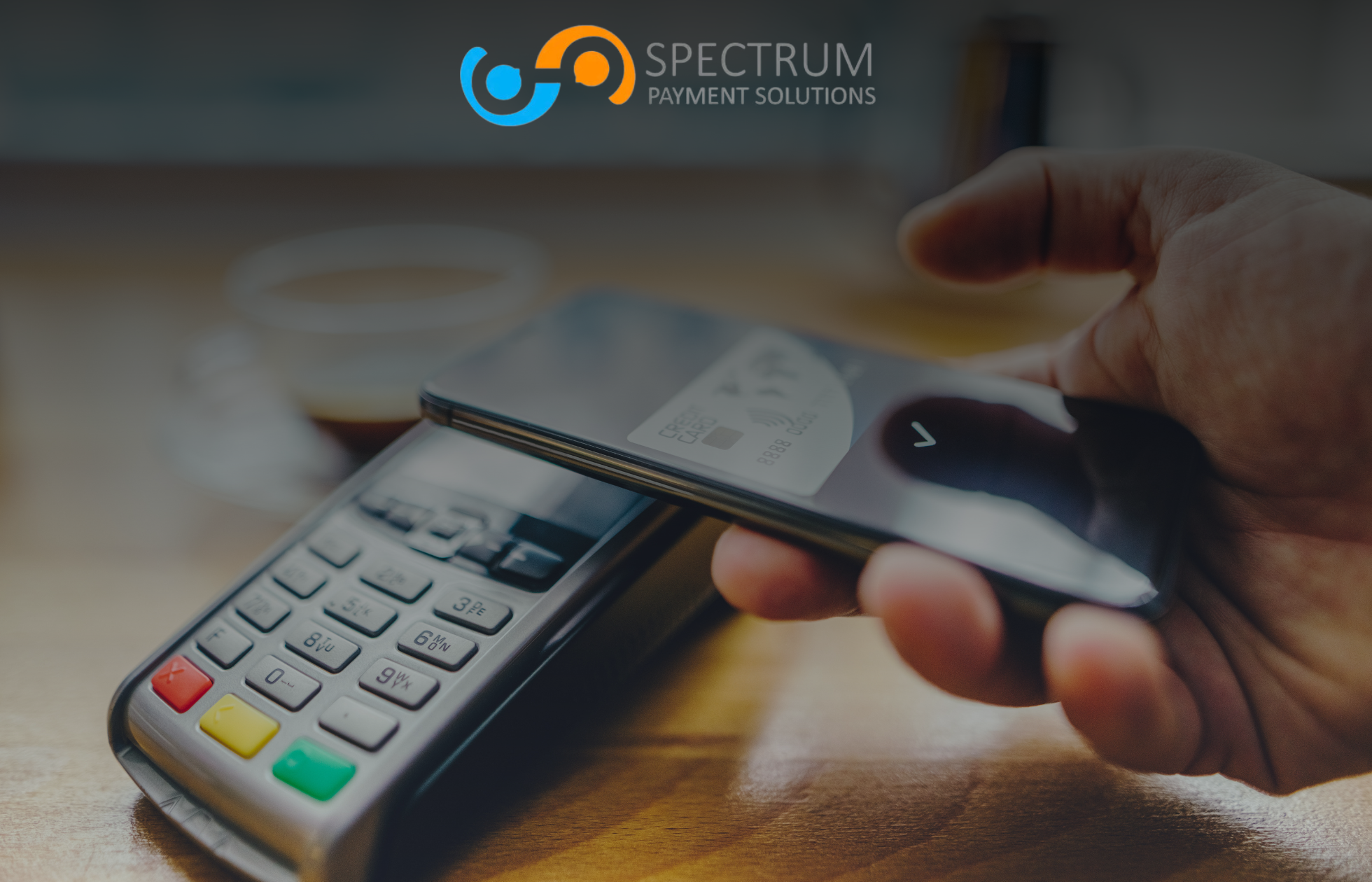 Contactless payment with smartphone and credit card at POS terminal - Spectrum Payment Solutions digital wallet processing